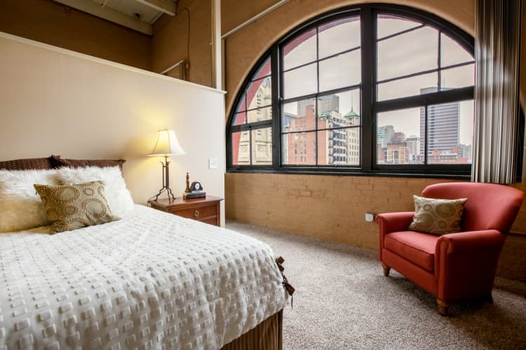 Cincinnati apartments for rent - image - Sycamore Place Lofts bedroom view of downtown Cincinnati