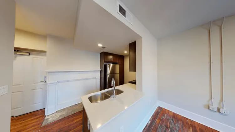 undefined apartments for rent - image - 1606 Race 201 kitchen living.webp