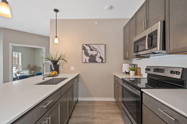 Cincinnati apartments for rent - image - Kitchen to Den Layout at Vicinity