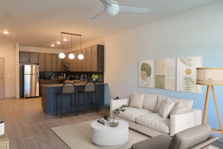 Cincinnati apartments for rent - image - Altura Apartments kitchen equipped for culinary enthusiasts, adjacent to an expansive living room area.