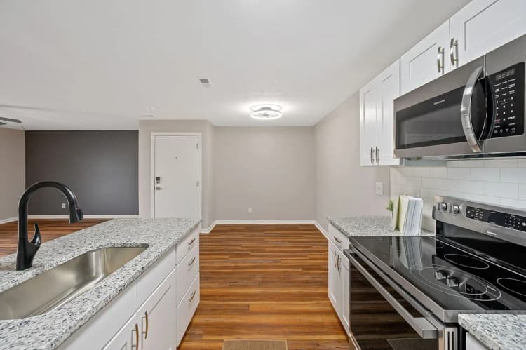 Cincinnati apartments for rent - image - Bridgewater Crossing - Kitchen & Living Room.webp