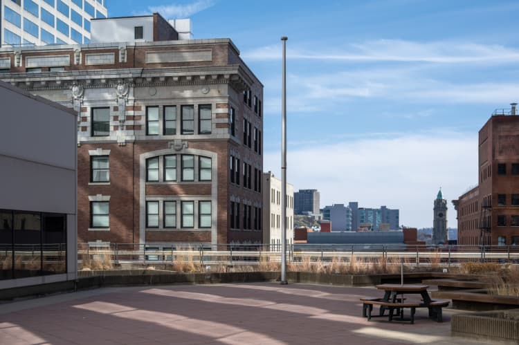 undefined apartments for rent - image - A large building with a clock tower in the background.
