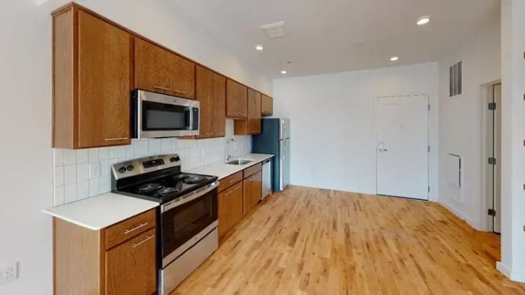 undefined apartments for rent - image - 1600-Pleasant-505-Kitchen.webp