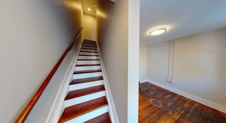 undefined apartments for rent - image - 1606 Race 201 stairs.webp