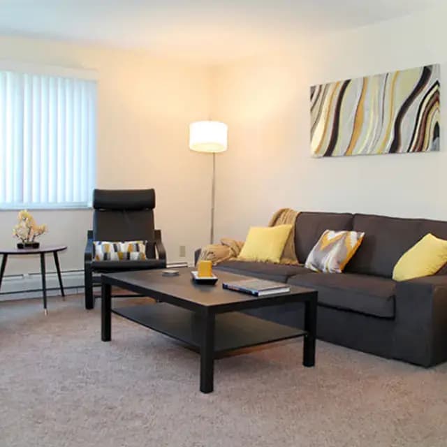 undefined apartments for rent - image - riverstone-court-living-room.jpeg.webp