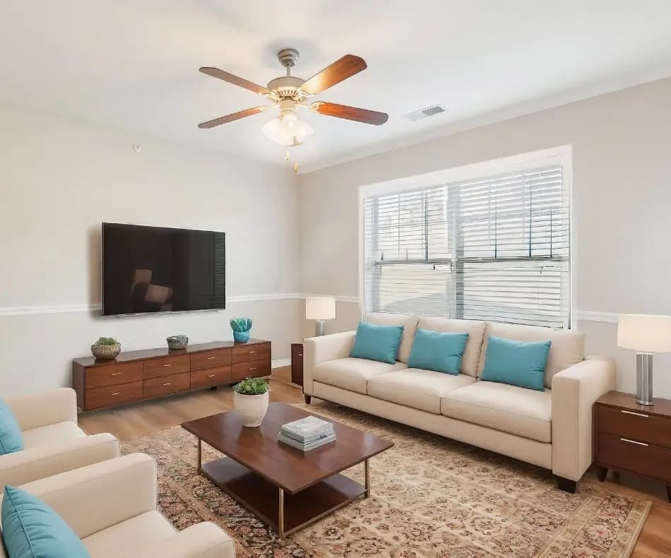 undefined apartments for rent - image - wb-living-room-with-teal-accent-pillows-tour.jpg