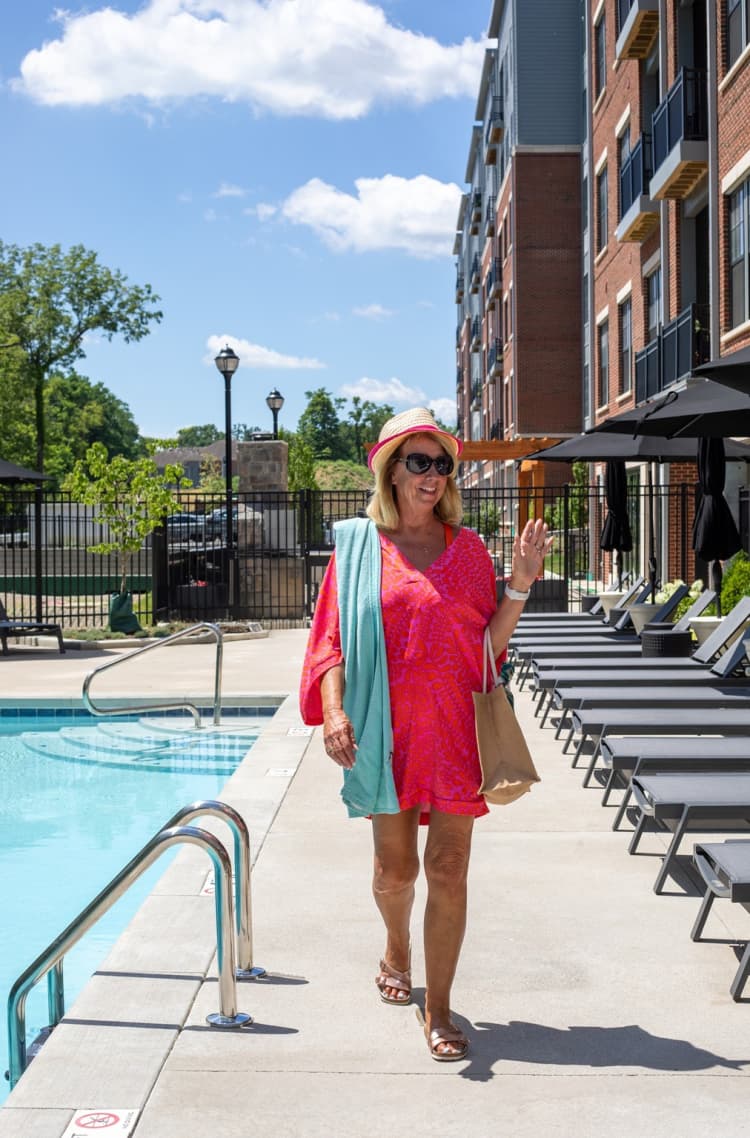 undefined apartments for rent - image - Residents Lounging by the Pool | Cincinnati OH Apartments For Rent | The residences at MQ